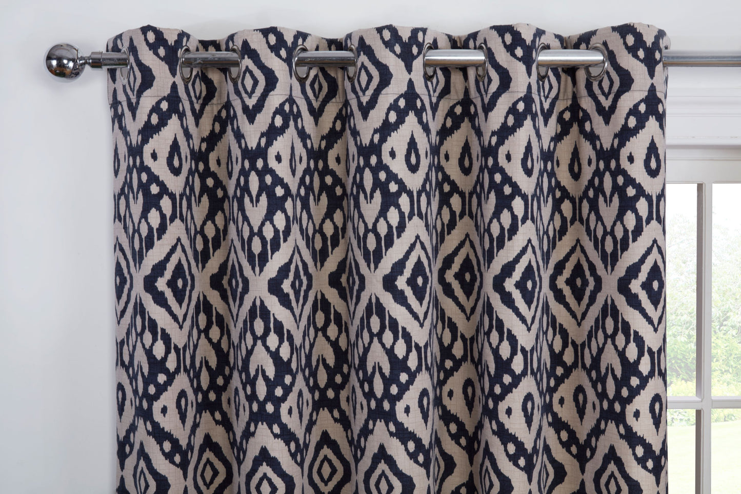 Marrakech Geometric Design Eyelet Curtains Inky Blue